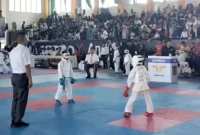 Staf Ahli Bidang Kemasyarakatan dan SDM Kota Padang, Feri Mulyani Hamid menghadiri ajang The Arena of Maestro x Andalas University Open Karate Championship 2026 di GOR FIK UNP, Sabtu (29/8/2026). (Foto: Pemko Padang)