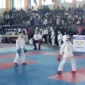 Staf Ahli Bidang Kemasyarakatan dan SDM Kota Padang, Feri Mulyani Hamid menghadiri ajang The Arena of Maestro x Andalas University Open Karate Championship 2026 di GOR FIK UNP, Sabtu (29/8/2026). (Foto: Pemko Padang)