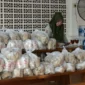 Pemko Padang menyalurkan 6.000 paket makanan dan logistik untuk korban banjir. (Foto: Pemko Padang)