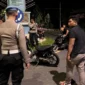 Polres Pariaman menertibkan balap liar di Jalan By Pass. Sejumlah motor berknalpot brong turut diamankan. (Foto: Polda Sumbar)