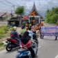 KAI Divre II Sumbar melakukan sosialisasi keselamatan kepada pengguna jalan. (Foto: KAI Divre II Sumbar)