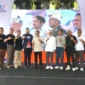 Menteri Ekraf Teuku Riefky Harsya didampingi Wali Kota Padang Fadly Amran membuka kegiatan Talk on Taste di Mini Stage Kawasan Kota Tua, Minggu (9/8/2026). (Foto: Pemko Padang)