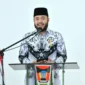 Wali Kota Padang Fadly Amran memberikan sambutan saat Pengukuhan Pengurus PGRI Padang Masa Bakti XXIII Tahun 2025-2030 di Bagindo Aziz Chan Youth Center, Rabu (26/8/2026). (Foto: Pemko Padang)
