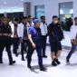 Dittipidsiber Bareskrim Polri berhasil menangkap DPO judi online FP di Thailand dan membawanya ke Indonesia. (Foto: Humas Polri)