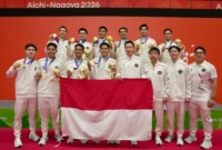 Tim bulu tangkis beregu putra Indonesia berhasil meraih medali emas usai menumbangkan China 3-2 di Asian Games 2026. (Foto: Kemenpora)