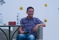 Kepala Diskominfo Padang Tommy TRD saat menjadi pemateri talkshow dalam COMMFEST di Fabriek Padang, Minggu (27/9/2006). (Foto: Pemko Padang)