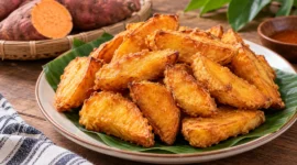 Ilustrasi ubi goreng. (Foto: AI Generated)
