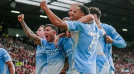 Pemain Manchester City merayakan gol ke gawang Manchester United di Old Trafford, Minggu (13/9). (Foto: Mancity)