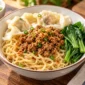 Ilustrasi bakmi ayam. (Foto: AI Generated)
