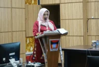 Kepala Bidang Informasi dan Komunikasi Publik Diskominfo Padang Suryani menyampaikan sambutan. (Foto: Pemko Padang)