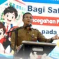 Kepala Disdikbud Padang Yopi Krislova memberikan sambutan saat kegiatan pendampingan pencegahan perundungan, kekerasan, dan intoleransi bagi 342 guru SD se-Kota Padang di Gedung Youth Center Padang, Rabu (21/10/2026). (Foto: Pemko Padang)