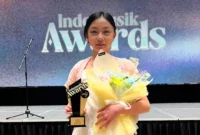 Lindee Cremona meraih Indomusik Awards 2026 lewat lagu Kucing - di Tempat Biasa. (Foto: IG @podcastsomestory)