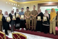 Lima RT di Batang Arau meraih penghargaan Padang Rancak Award sesi II 2026. (Foto: Pemko Padang)
