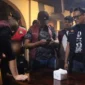 Petugas gabungan memeriksa pengunjung dalam operasi terpadu pengawasan tempat hiburan malam di Padang, Minggu (18/10/2026). (Foto: Humas Satpol PP Padang)