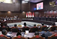 Suasana sidang pengucapan putusan sengketa Perselisihan Hasil Pemilihan Umum Presiden dan Wakil Presiden di Ruang Sidang MK, Selasa (6/10). (Foto Humas/Ifa)