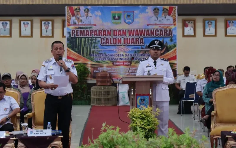 Wakil Wali Kota Elzadaswarman menyampaikan sambutan saat tahapan Pemaparan dan Wawancara Calon Juara Penjaringan Desa dan Kelurahan Berprestasi Tingkat Nasional 2026 di Aula Josrizal Zain, Balai Kota Payakumbuh, Rabu (7/10/2026). (Foto: MC Payakumbuh)