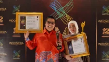Wali Kota Padang Panjang Hendri Arnis dan Ketua TP-PKK Maria Feronika Hendri meraih penghargaan ILMA 2026 di Bali. (Diskominfo Padang Panjang)