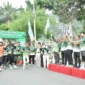 Wakil Wali Kota Padang Maigus Nasir melepas peserta Fun Run APTFI 2026 di bawah Jembatan Siti Nurbaya (10/10/2026). (Foto: Pemko Padang)